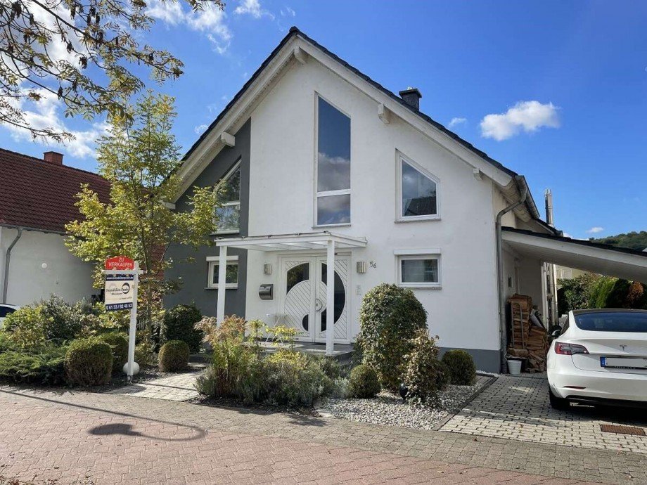 Stra�enansicht mit Carport Einfamilienhaus Dienheim